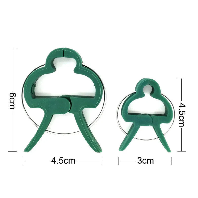 Green plastic and zinc plant fixing clips set with large and small sizes for climbing garden plants