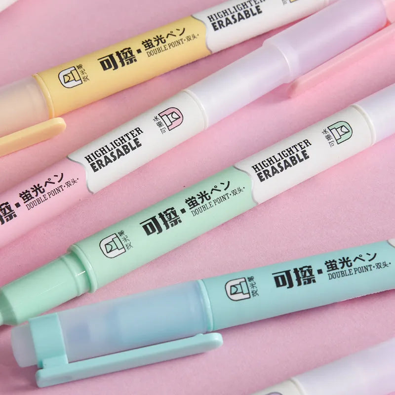 Set of six double-headed fluorescent graffiti marker pens with plastic shells in assorted colours
