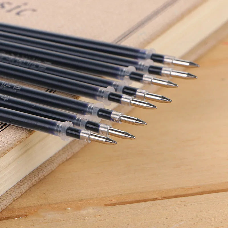 Automatic fade pen set showing pen holder, case, and eight refill units for temporary marking.