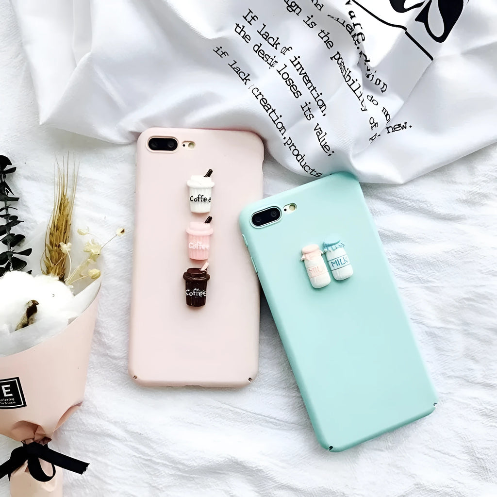 Soft pink TPU silicone iPhone case with a raised 3D cartoon cat design on the back.