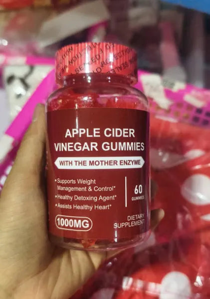 Bottle of apple cider vinegar gummies containing 60 soft candy tablets for adult supplementation