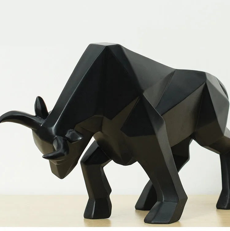 Black geometric resin bull sculpture on a shelf, abstract bison statue for modern home decor