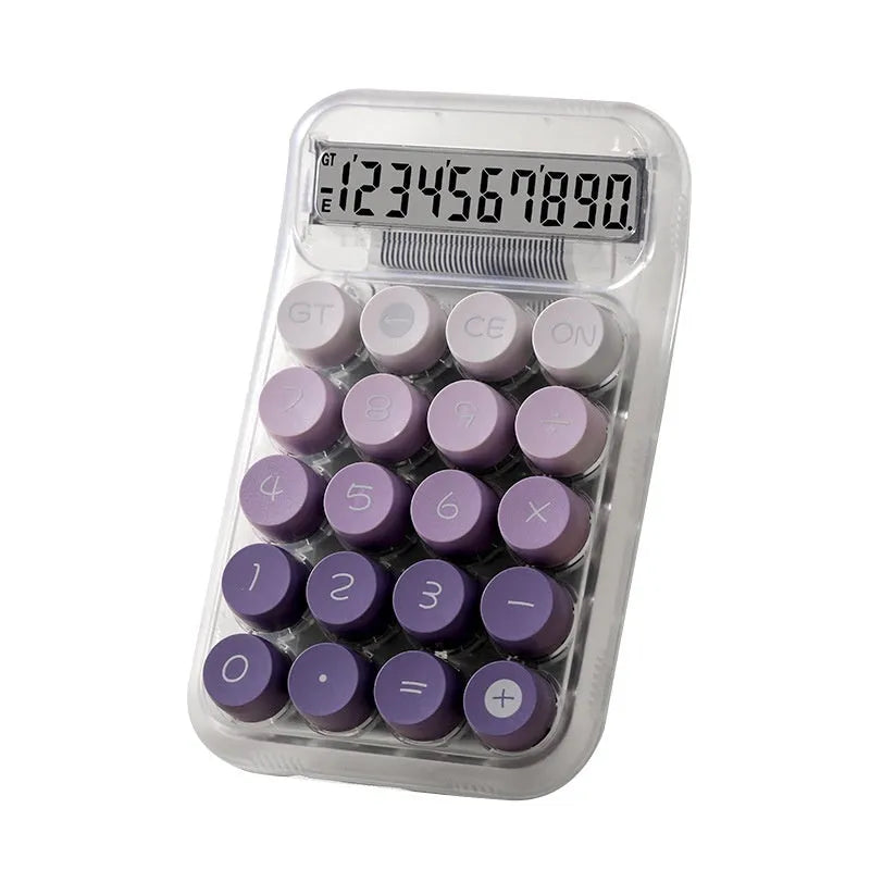 Round mechanical keyboard calculator in a muted colour with large LCD display on desk.