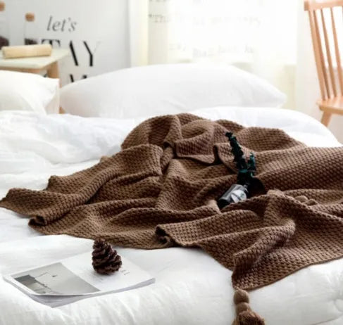 Nordic fringed knit ball blanket in acrylic measuring 130×170cm in beige colour