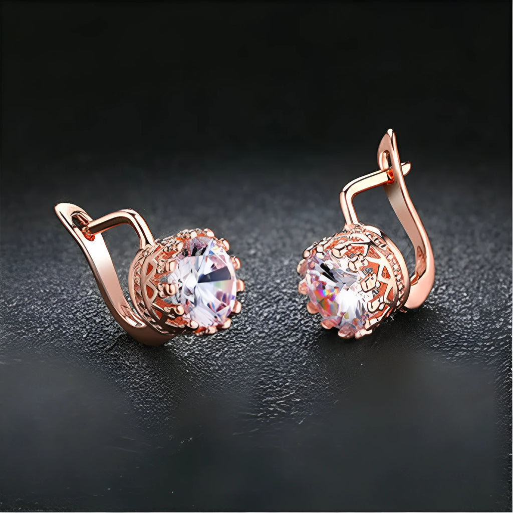 Crown-shaped clip-on earrings with white diamond details in rose gold or white gold colour finish