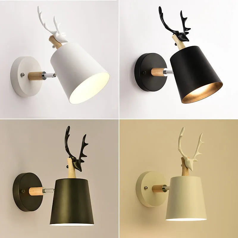 Modern antler bedside wall lamp in black iron and wood, 24x29cm with E27 bulb base.