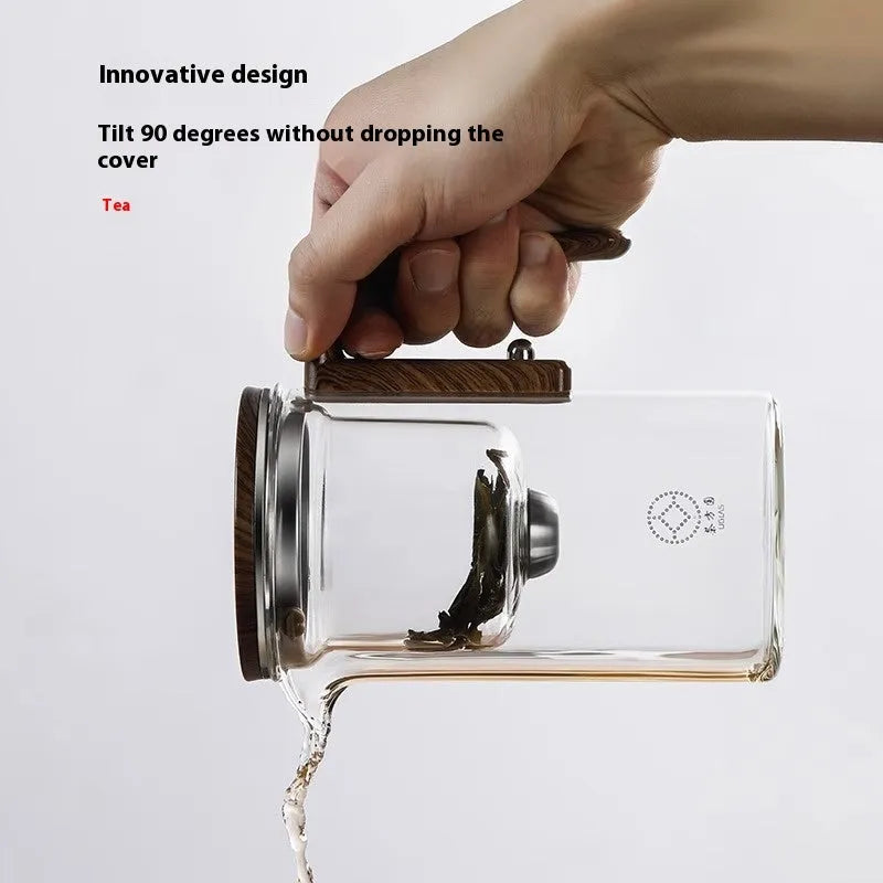 Glass teapot with magnetic tea leaf separator and wooden handle shown in new Chinese style.