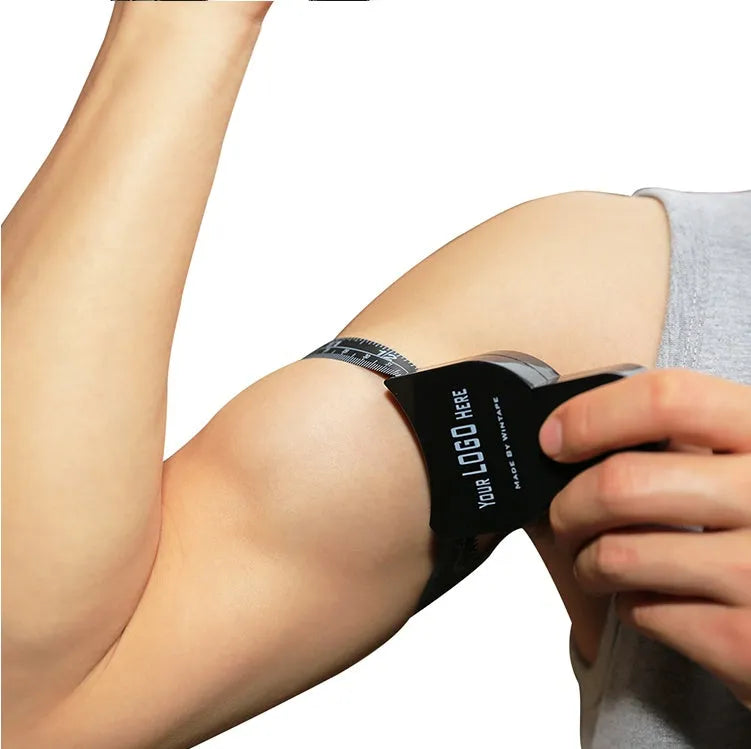 Black ABS body fat caliper measurement tool with digital display and cable