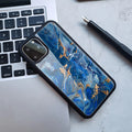 Marble pattern plastic iPhone case in black and gold colour combination showing back cover design