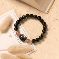 Black obsidian bracelet with 8mm stones and kitty charms on adjustable cord