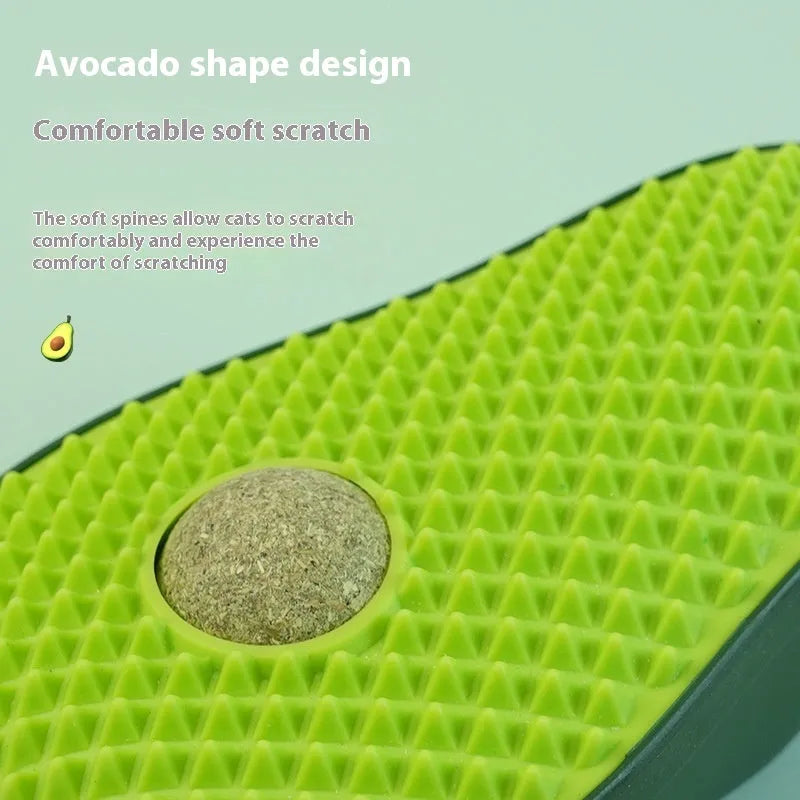 Green avocado-shaped cat scratching post toy on a plain background.