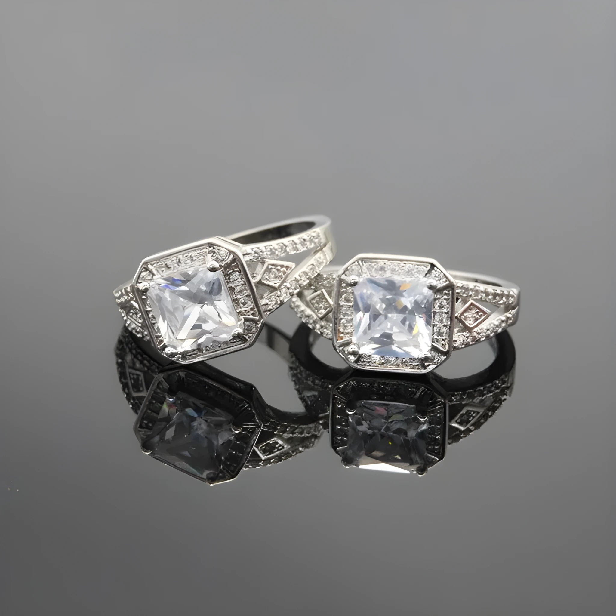 Women's geometric ring with hollow design and inlaid zircon stone in platinum colour.