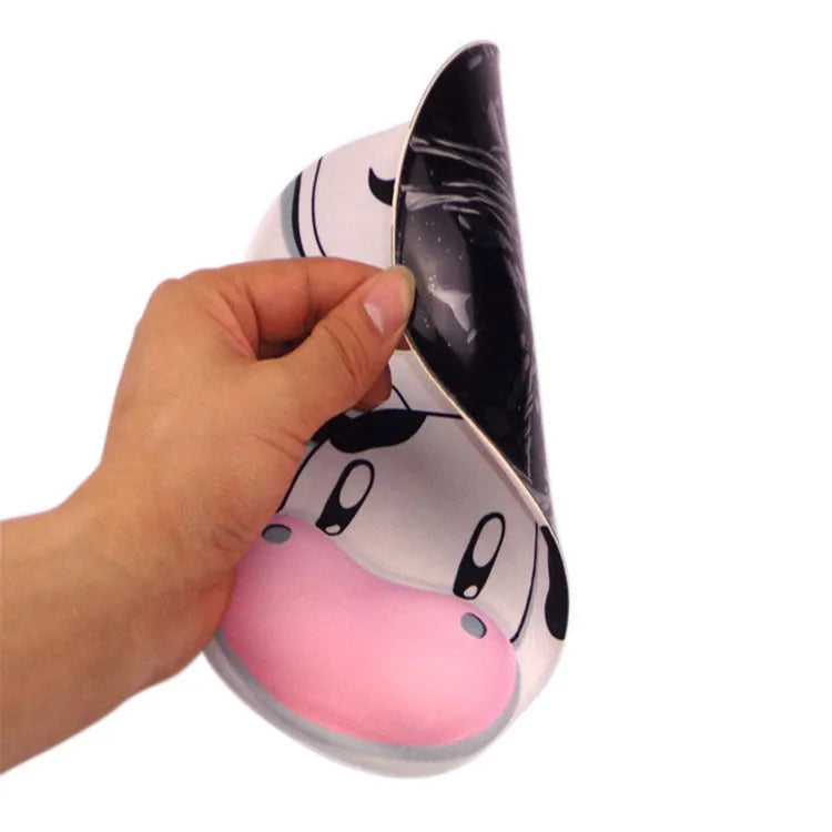 Cow silicone wrist rest mouse pad with soft non-slip surface on a desk
