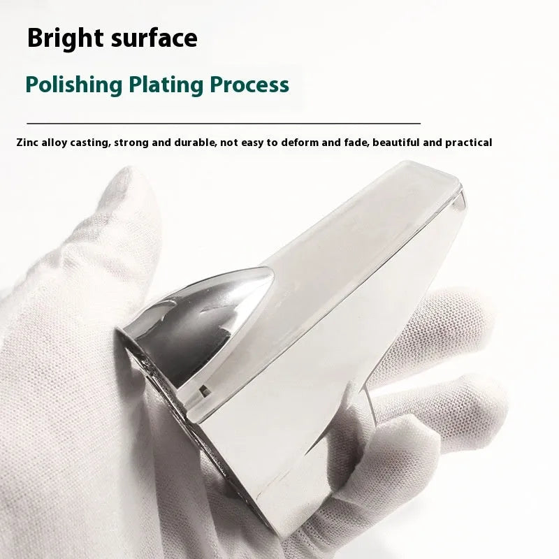 Set of silver electroplated adjustable partition clips in fish mouth and olecranon styles on a glass surface.