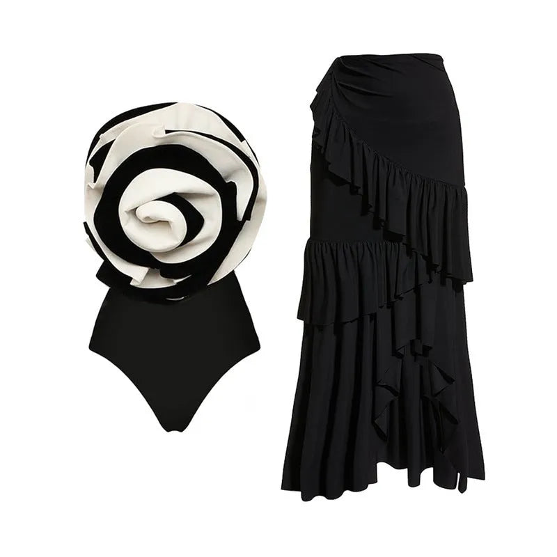 Women's black and white one-piece swimsuit with matching skirt for beach swimming