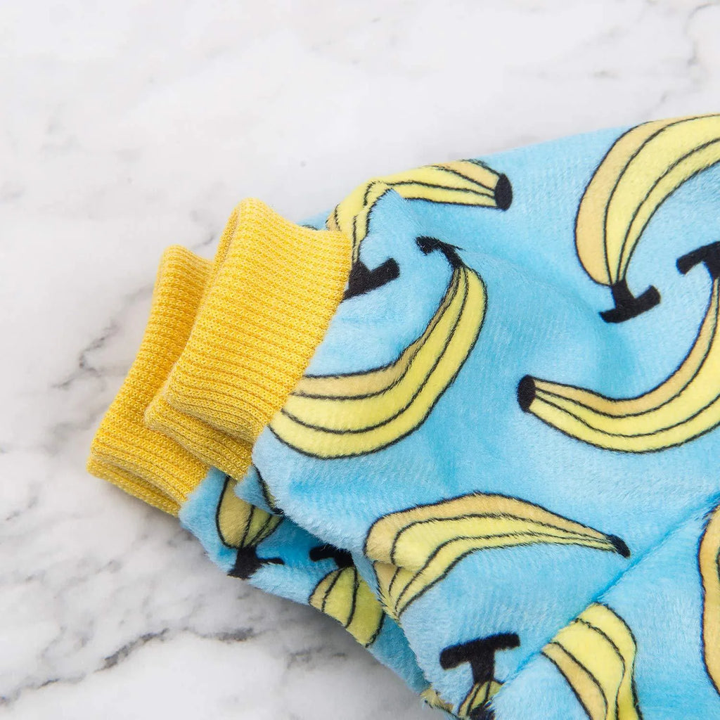 Polyester four-legs pet dog pajamas in Blue banana print, sizes XS to L, with cm measurements for collar, bust, and back length