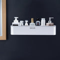 Plastic bathroom wall shelf with hole-free installation, shown holding shampoo and shower gel bottles.
