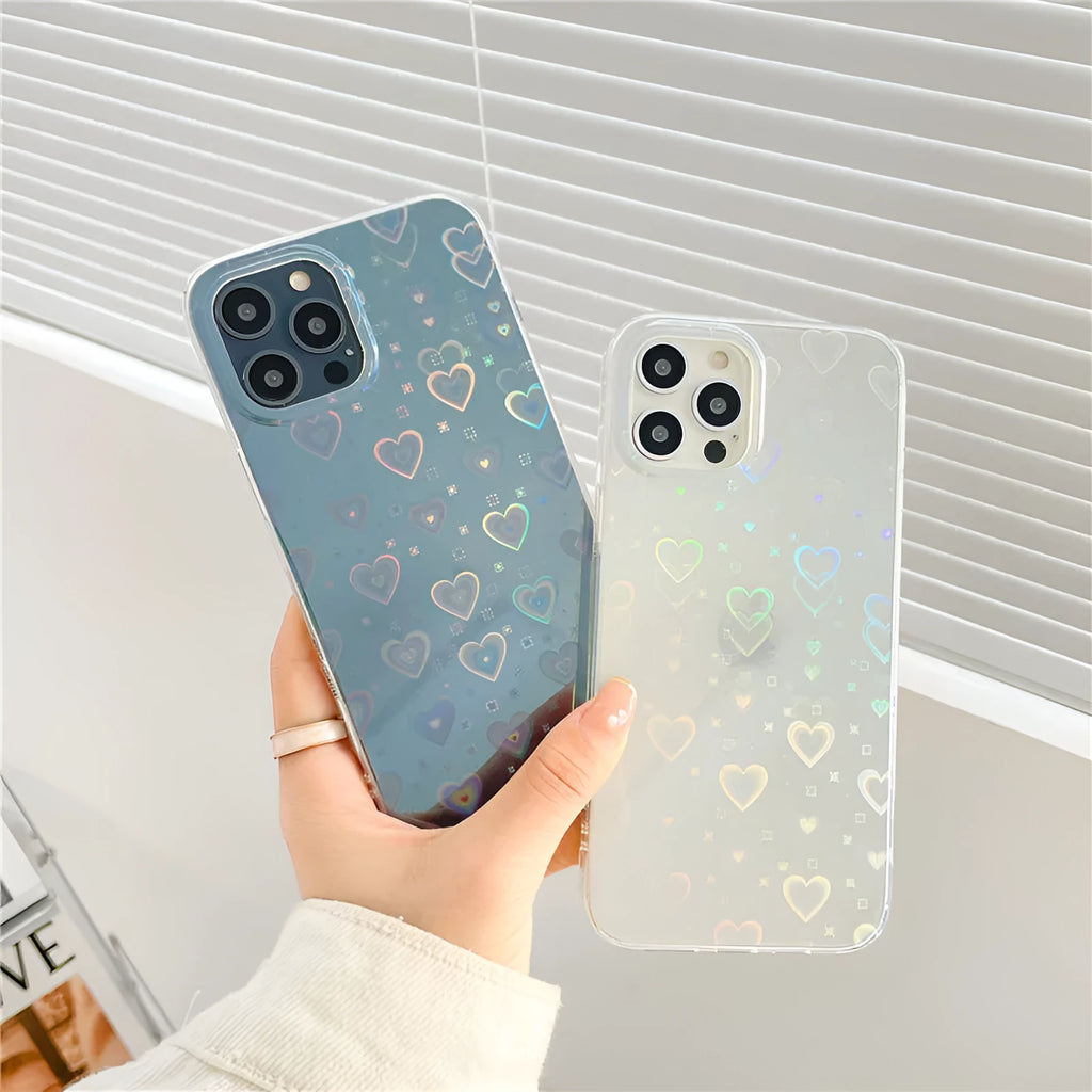 Transparent silicone iPhone case with laser love design, shown on a phone.