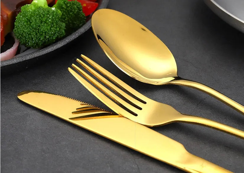 24-piece stainless steel tableware set showing knives, forks and spoons in multiple colour options