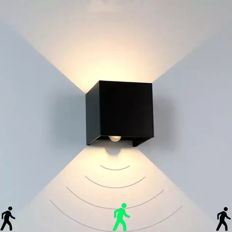 Aluminium cube wall lamp in black, grey, or white colours with 360-degree light distribution