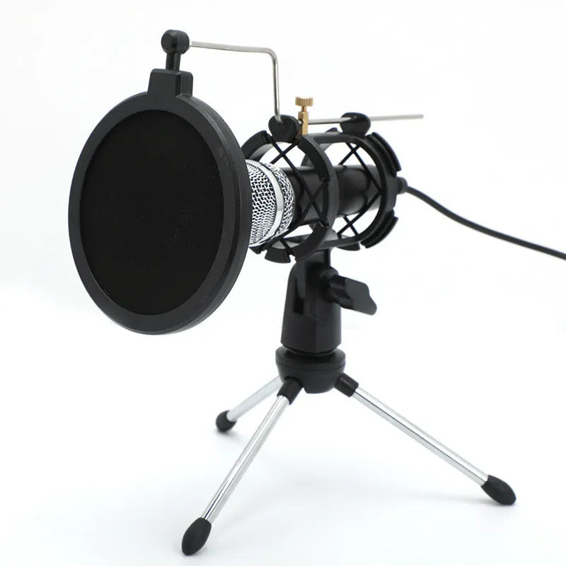 Black condenser microphone mounted on a silver aluminium adjustable stand with 3.5mm and USB cables.