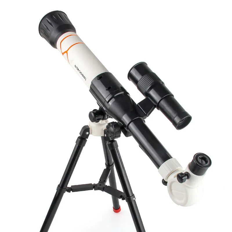 Yellow kids astronomical telescope with 150X magnification on adjustable tripod
