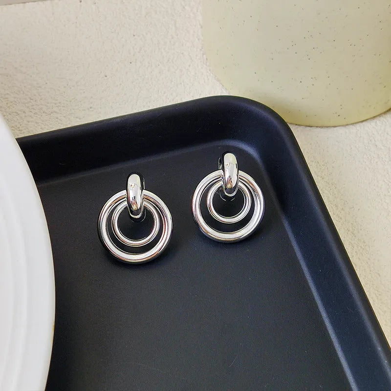 Geometric round ring earrings with irregular design in gold or silver electroplated finish