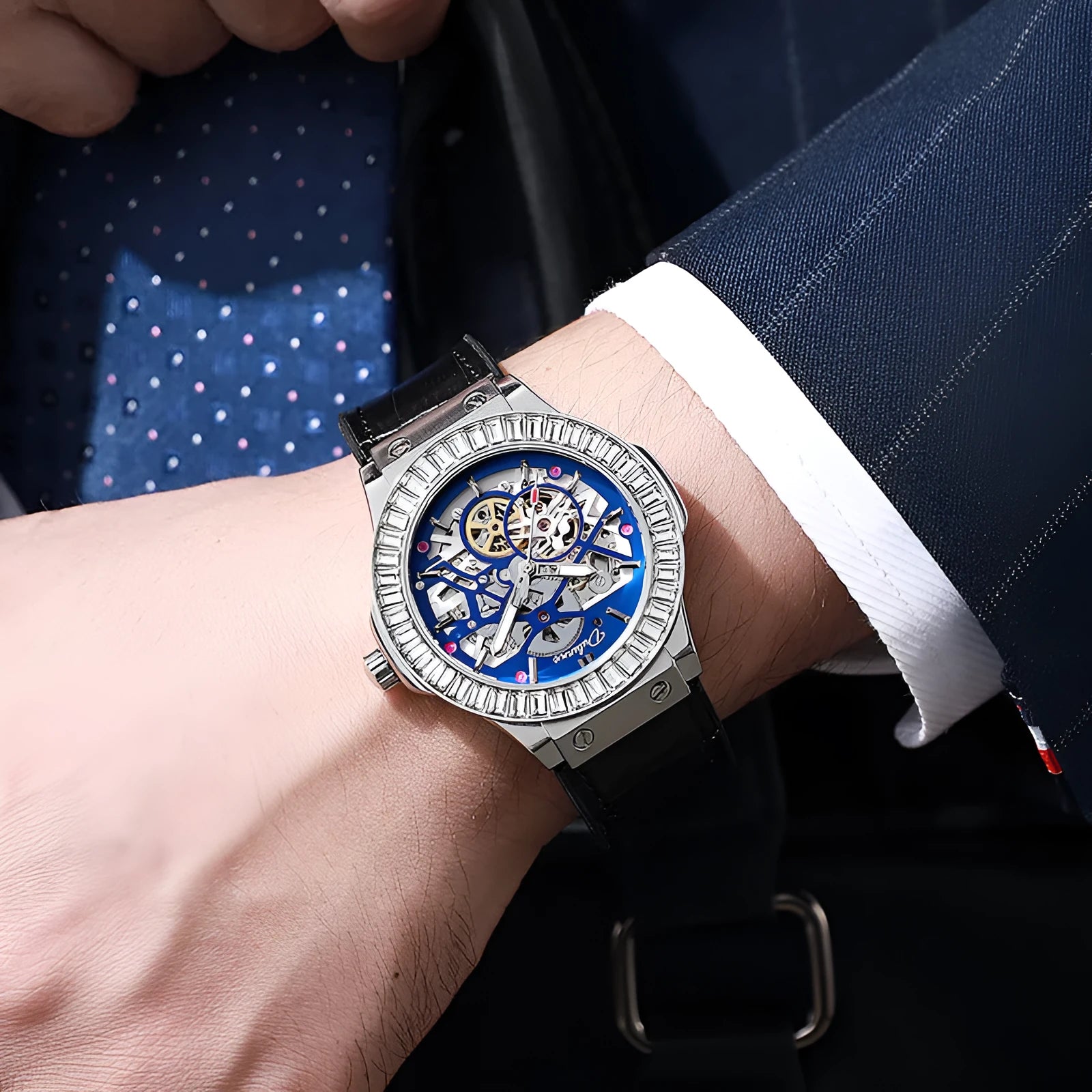 Men's automatic mechanical wristwatch with skeleton dial and diamond-studded stainless steel case.