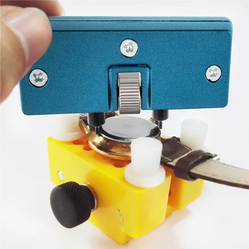 Yellow plastic watch repair case opener kit with mounting base and four positioning pillars