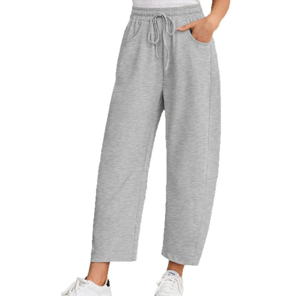 Women's loose-fit cropped sweatpants with drawstring waist and side pockets in cotton blend fabric