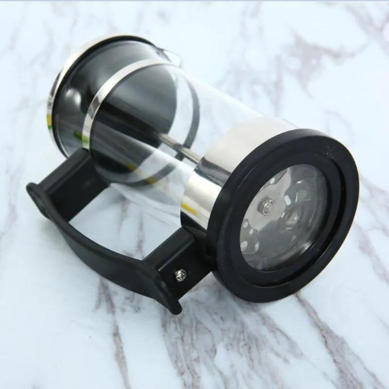 Compact 350ml capacity coffee maker made of glass and stainless steel.
