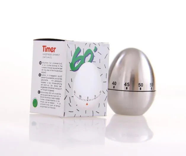 Stainless steel egg-shaped mechanical kitchen timer with manual dial.