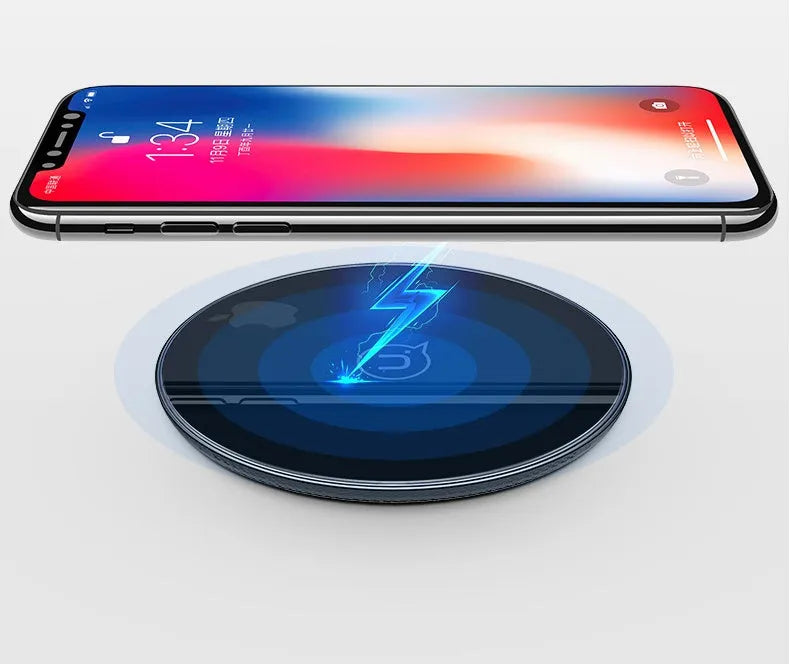 Glass disc wireless charger for smartphones in black or white with charging indicator