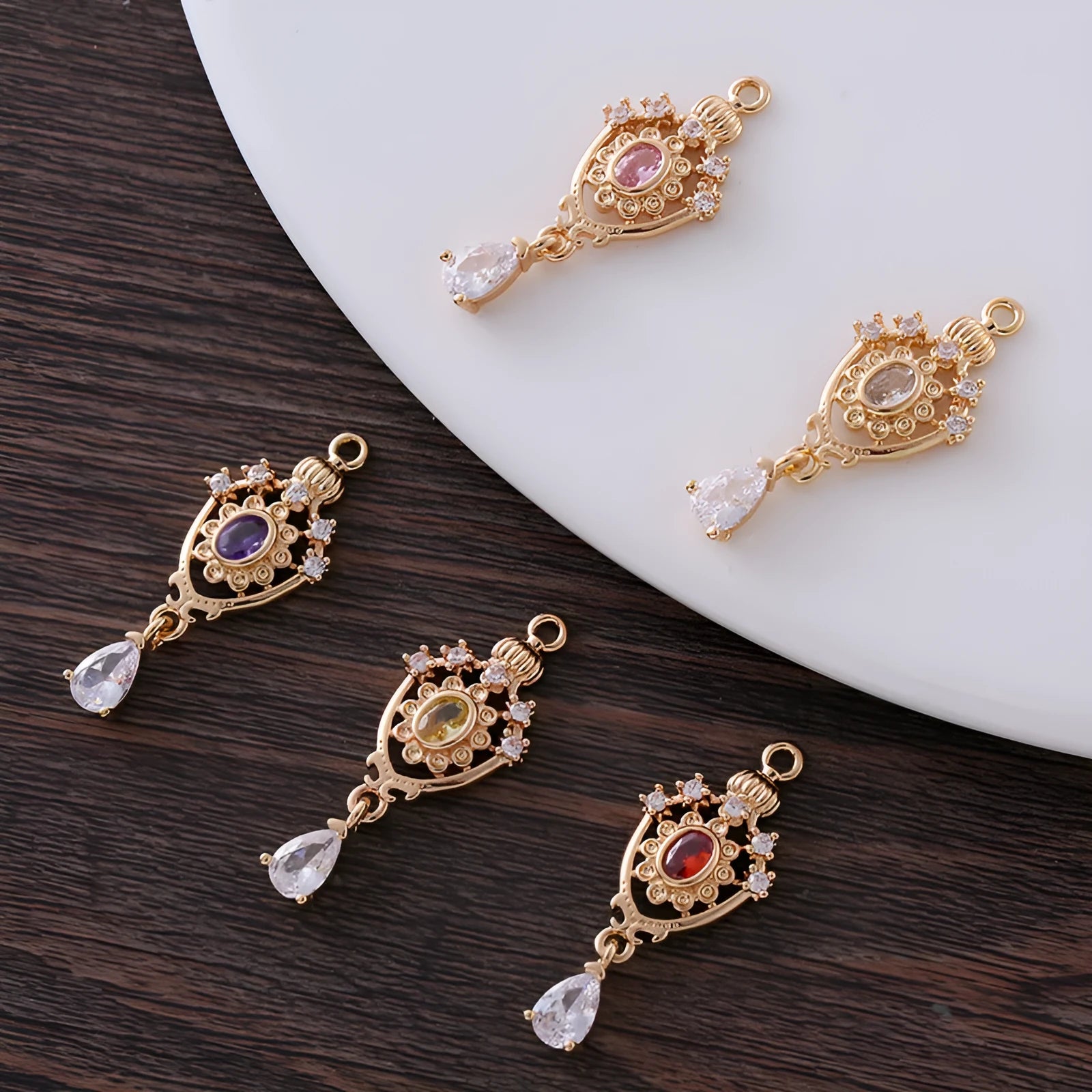 Small hollow water drop pendant with micro zircon detailing in five colour options measuring 12mm by 23mm