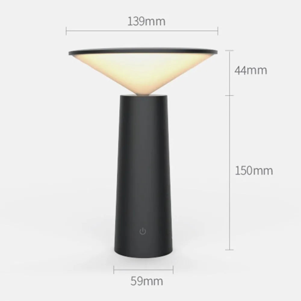 Black USB rechargeable desk lamp with touch sensor, tilted head, and 36 LED light source on a wooden table.