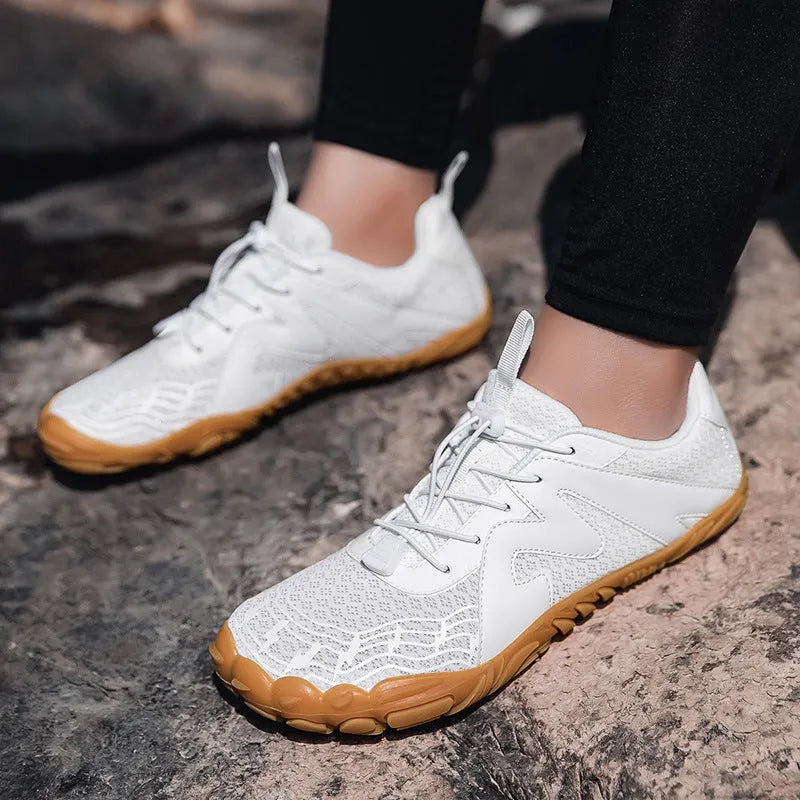 A pair of couple sports climbing shoes with a Flyknit lining and rubber sole in a choice of colours.