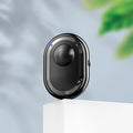 Compact black wireless Bluetooth remote control for smartphone camera photography