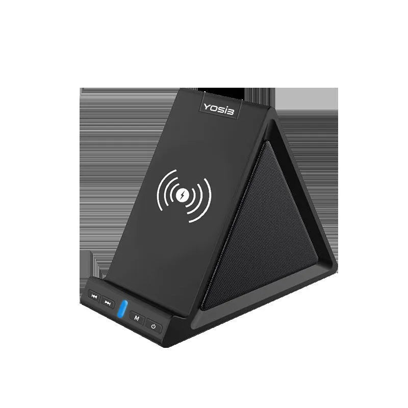Black Bluetooth speaker with built-in stand holding a mobile phone on a desk.