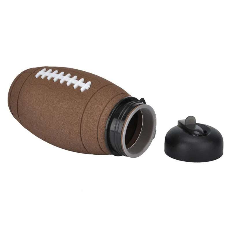 Brown rugby ball-shaped collapsible sports water bottle, 600ml, food-grade silicone, leak-proof seal, non-slip grip.