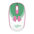 Pink Sailor Moon cartoon wireless mouse on a desk next to a laptop.