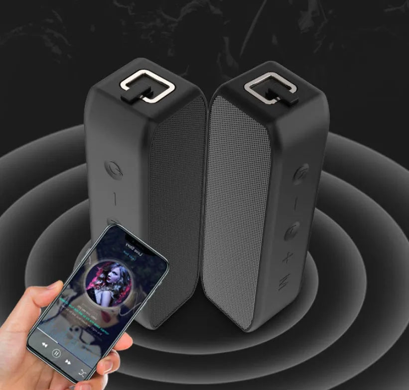 Black waterproof wireless Bluetooth speaker with 20W output power and 12-hour battery life