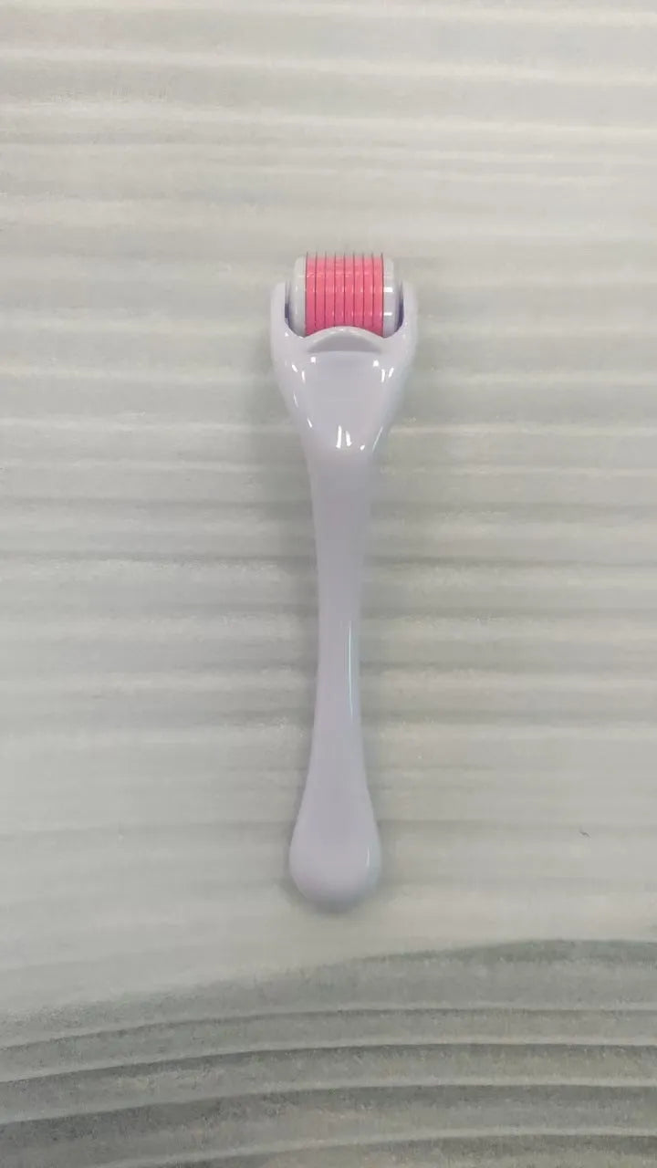 540 micro needle mechanical derma roller with black handle and coloured wheel options