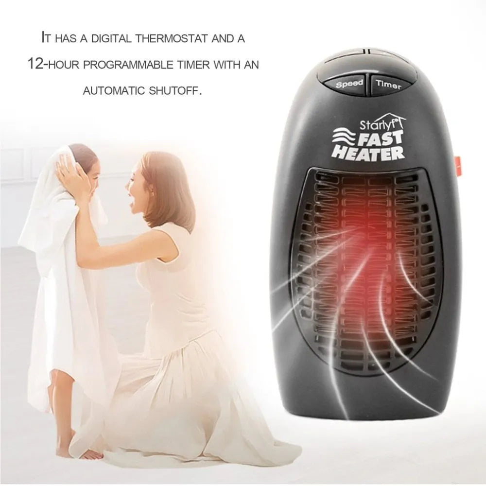 Black compact ceramic electric heater with digital display and a rotating plug on a desk.