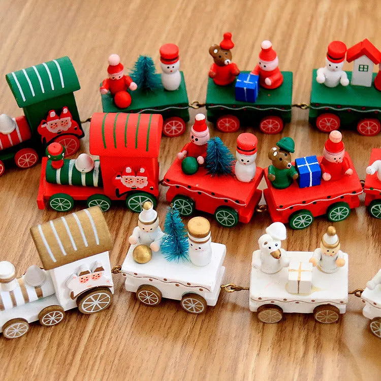 Set of four mini wood train toys in red white and green with painted passengers for shelf display