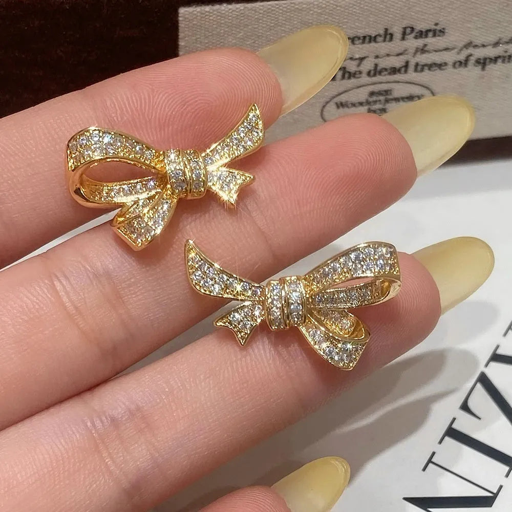Zircon bowknot ear stud and ring set in gold plated copper with 925 silver needle, affordable luxury style