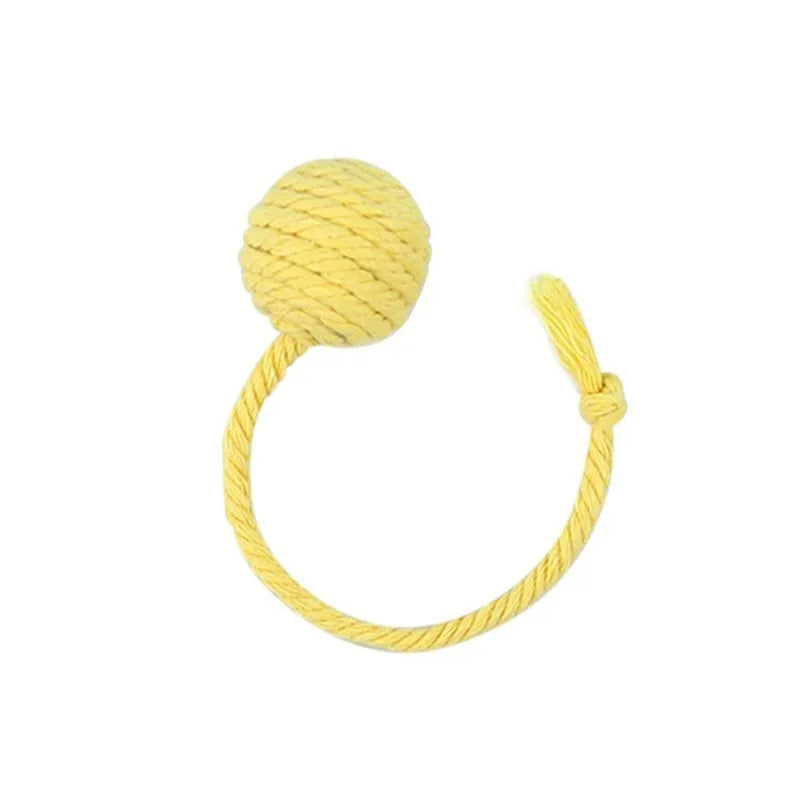 Cat toy ball with attached rope in green, pink, purple or yellow colours showing 3cm and 6cm size options