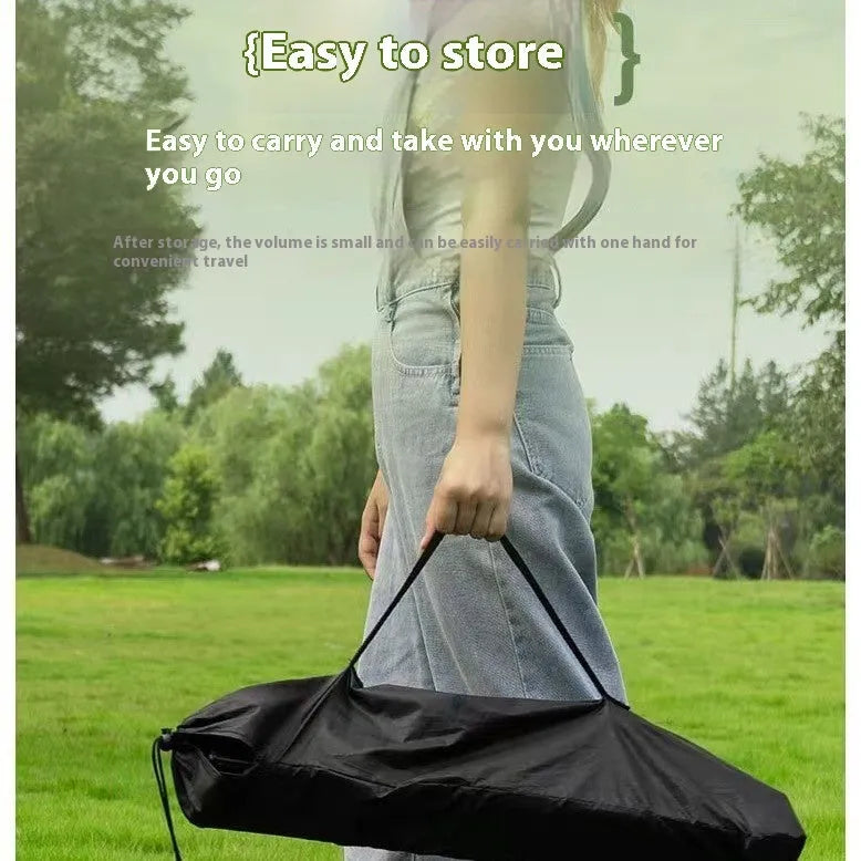 Ultralight aluminium alloy folding table in black carbon steel finish, folded flat for storage