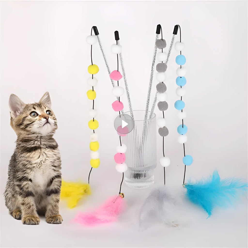 A blue acrylic cat teaser wand with pompon feathers and a bell, shown next to a grey and yellow version.