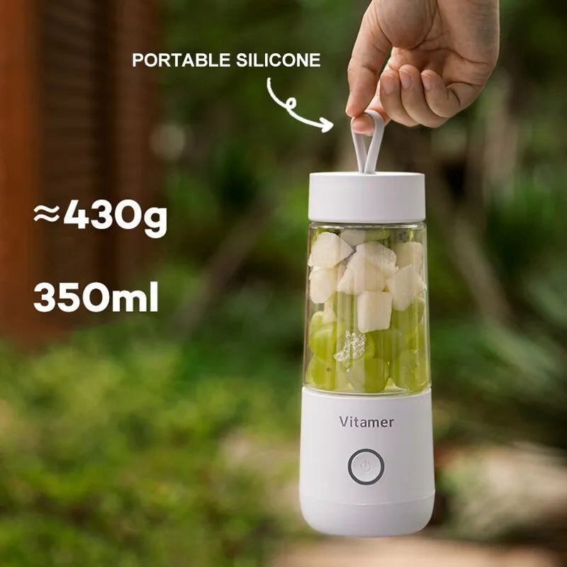 White portable USB rechargeable blender bottle with silicone carry ring, 350ml Tritan cup, and stainless steel blades.