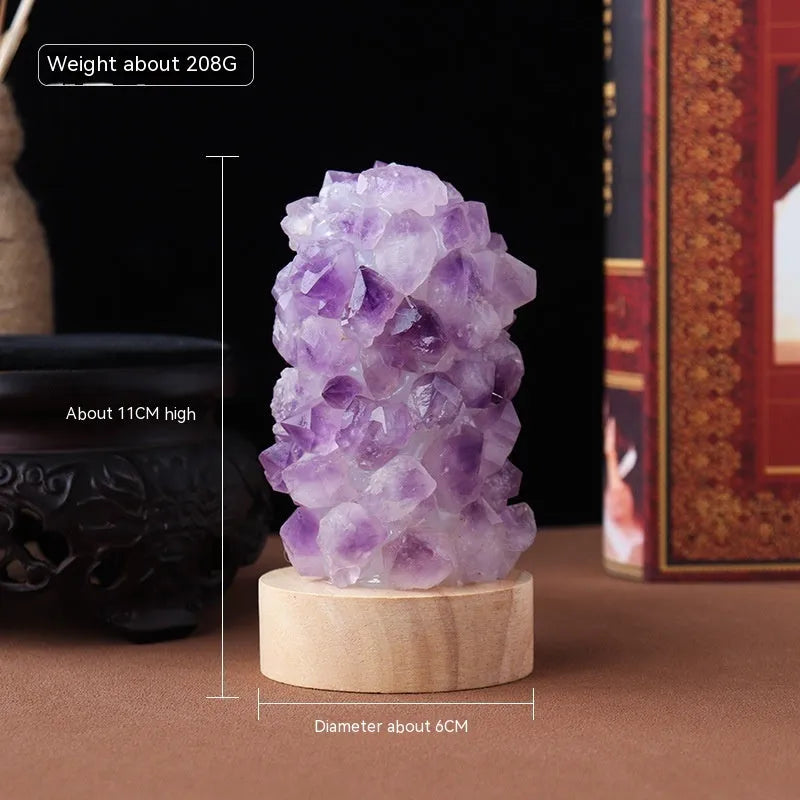 Natural amethyst crystal night light with USB plug showing both warm and cold light settings